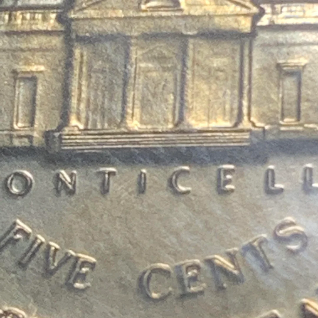 Side-by-side comparison of 1961 nickel Monticello reverse showing weak steps versus Full Steps designation